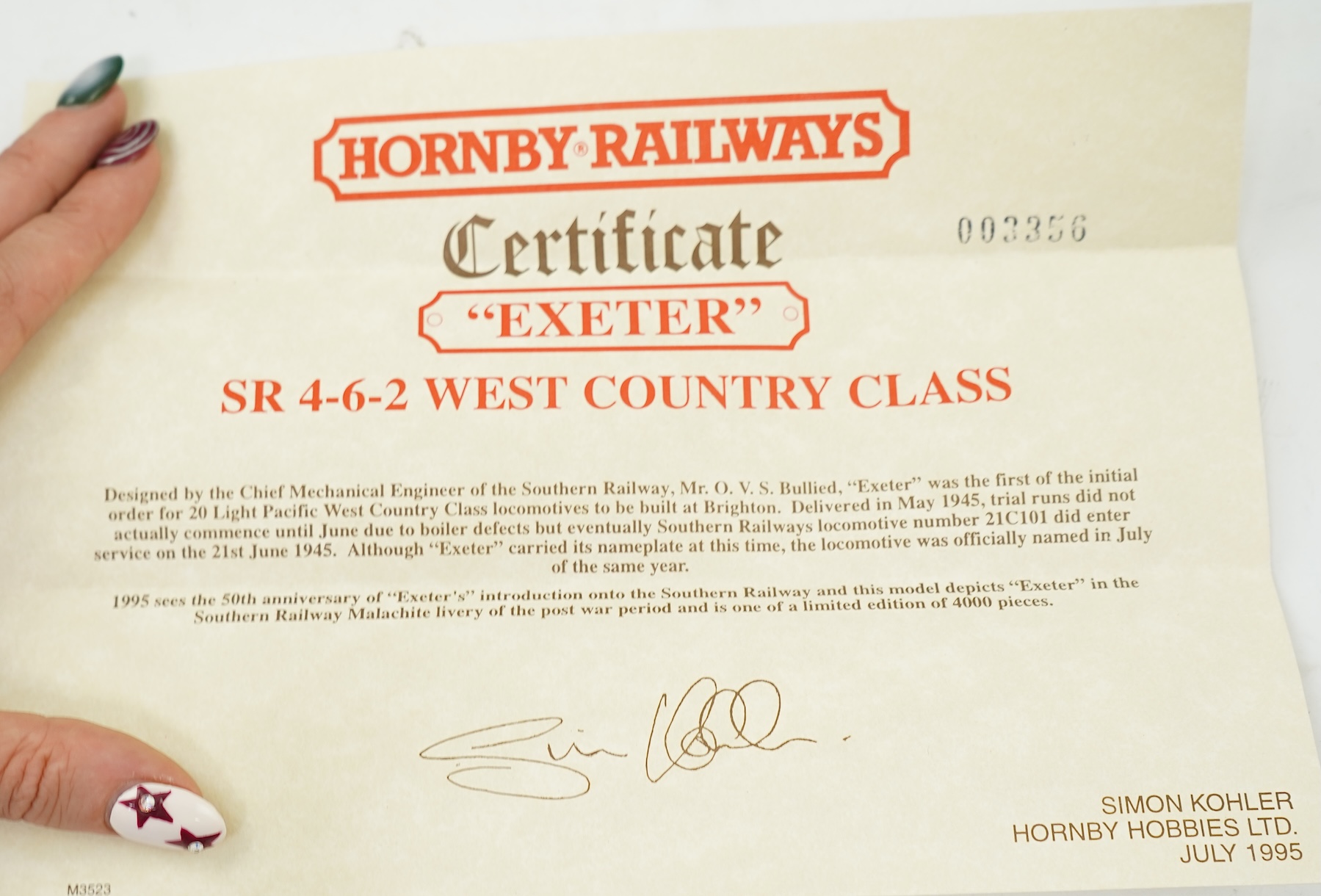 A wooden cased Hornby Railways 00 gauge railway Southern Railway West Country Class tender locomotive, Exeter 21C101